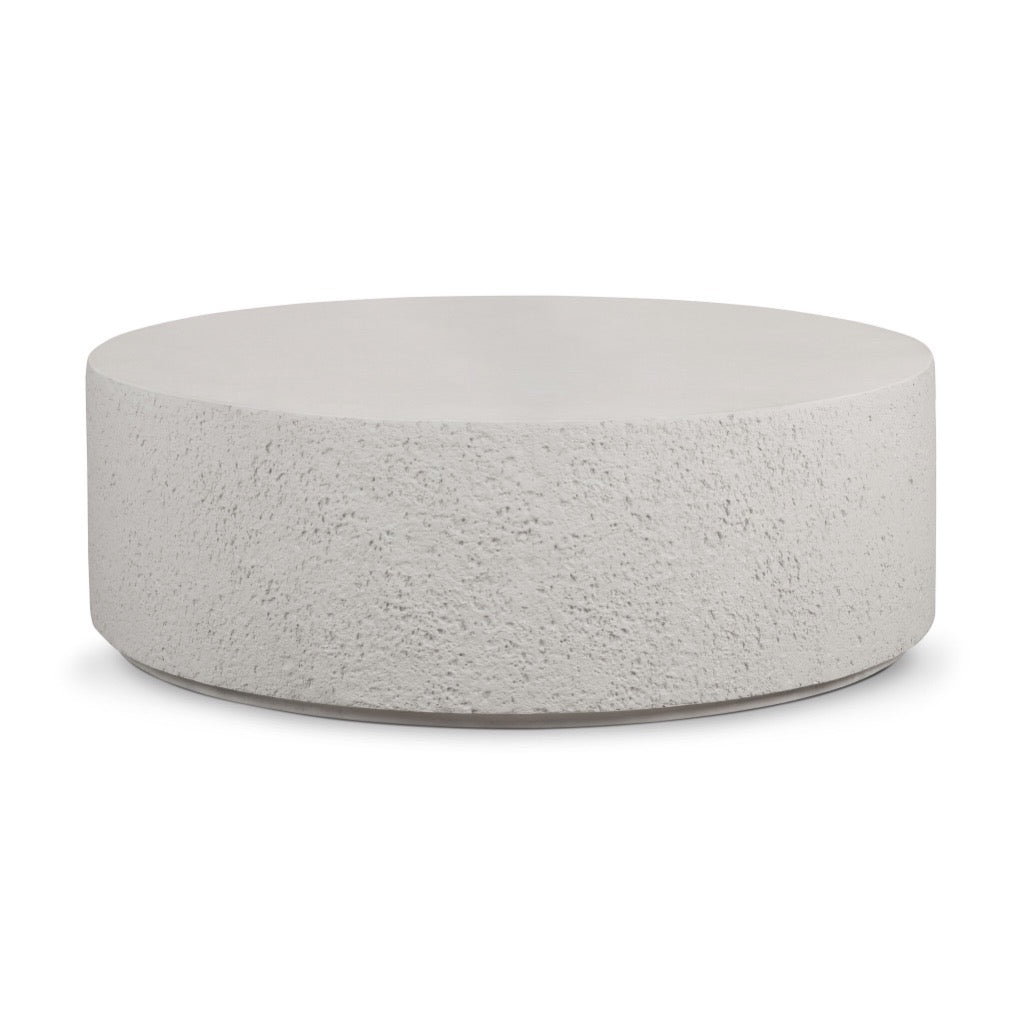 Otero Outdoor Round Coffee Table Matte Stone Angled View Four Hands