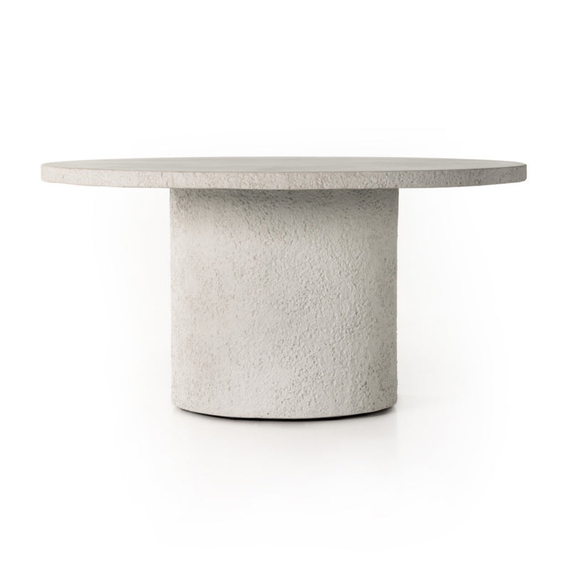 Otero Round Outdoor Dining Table Matte Stone Angled View Four Hands