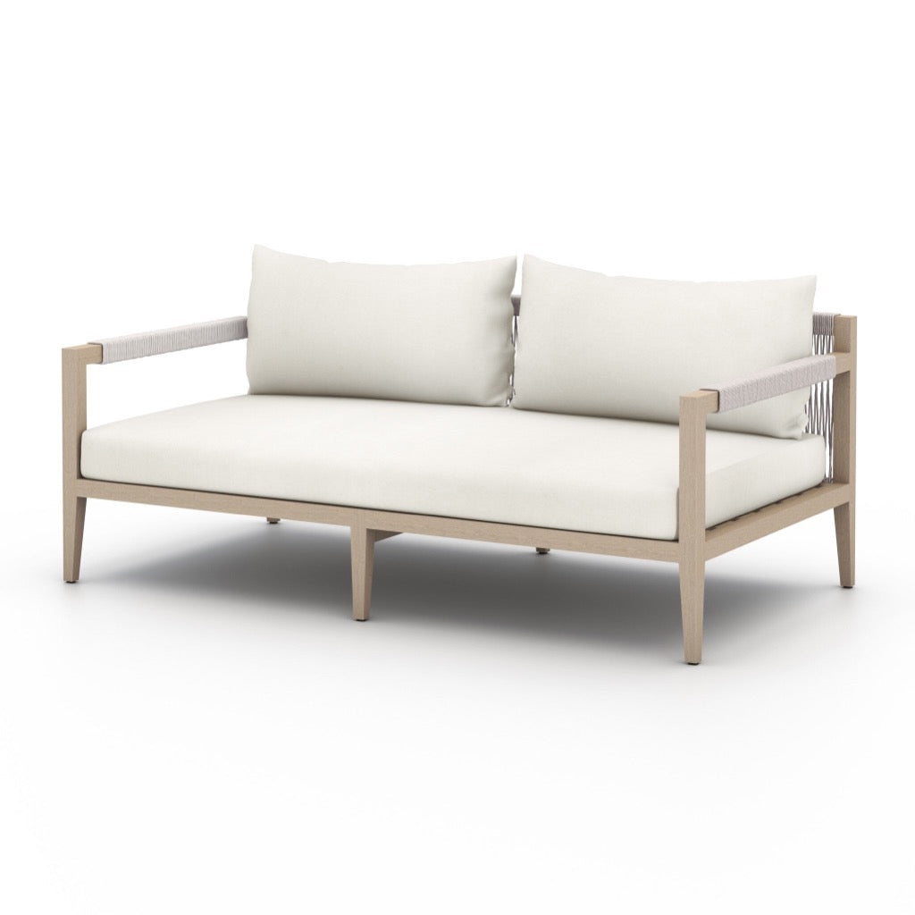 Sherwood Outdoor 63" Sofa Natural Ivory Angled View 223329-019