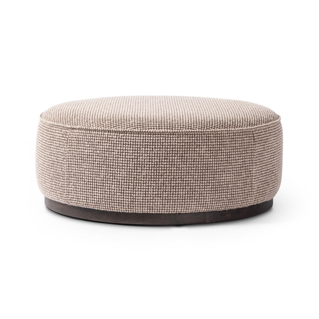 Sinclair Large Round Ottoman Barrow Taupe Angled View Four Hands