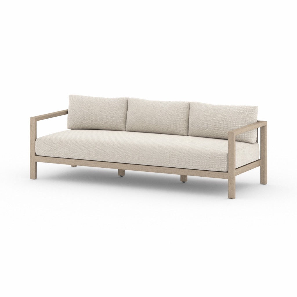 Sonoma Outdoor Sofa Faye Sand Angled View Four Hands